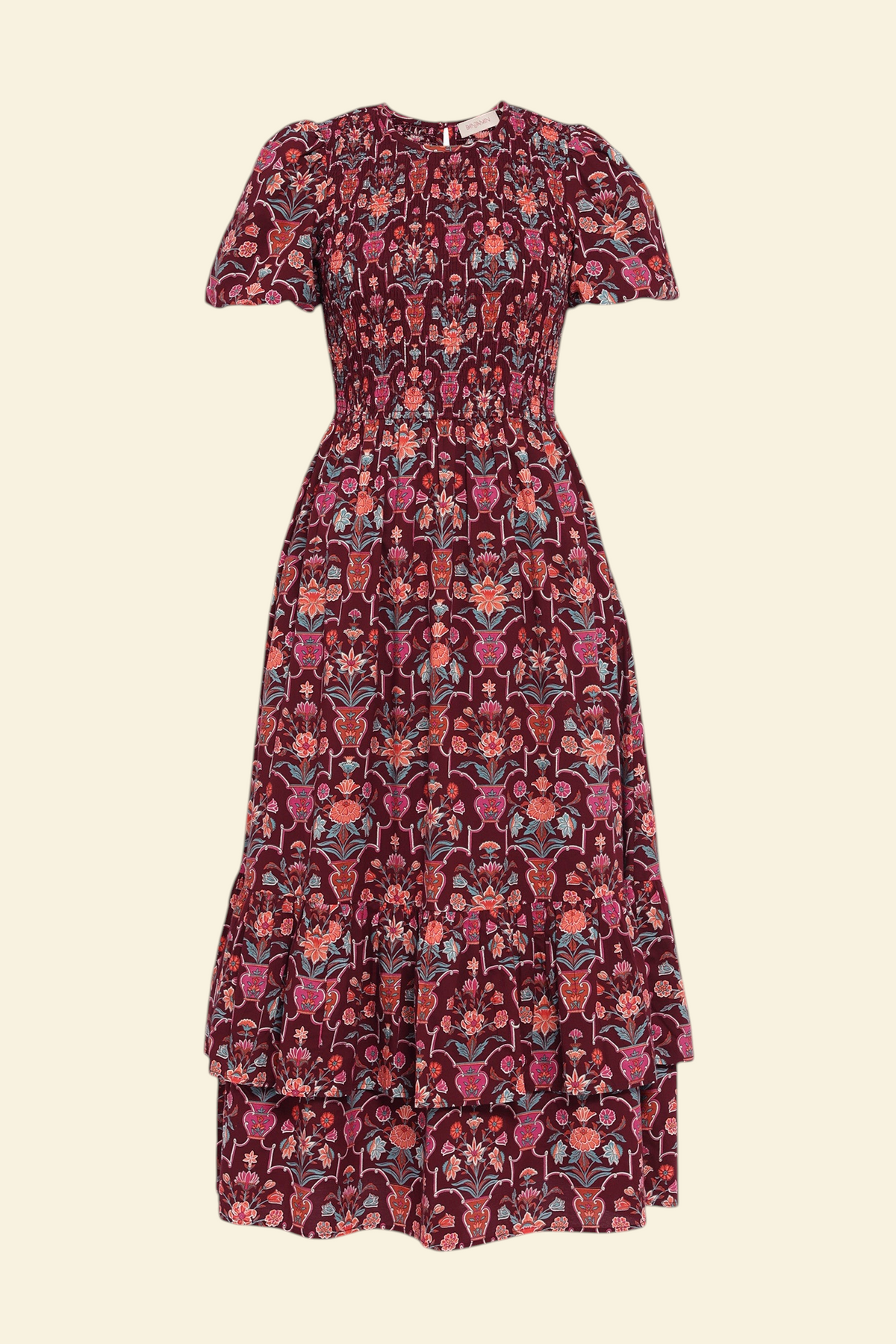 Front view of the Quant dress in Floral Vase print on a white background. It features a smocked bodice, puffed sleeves, and a full tiered skirt with pockets.