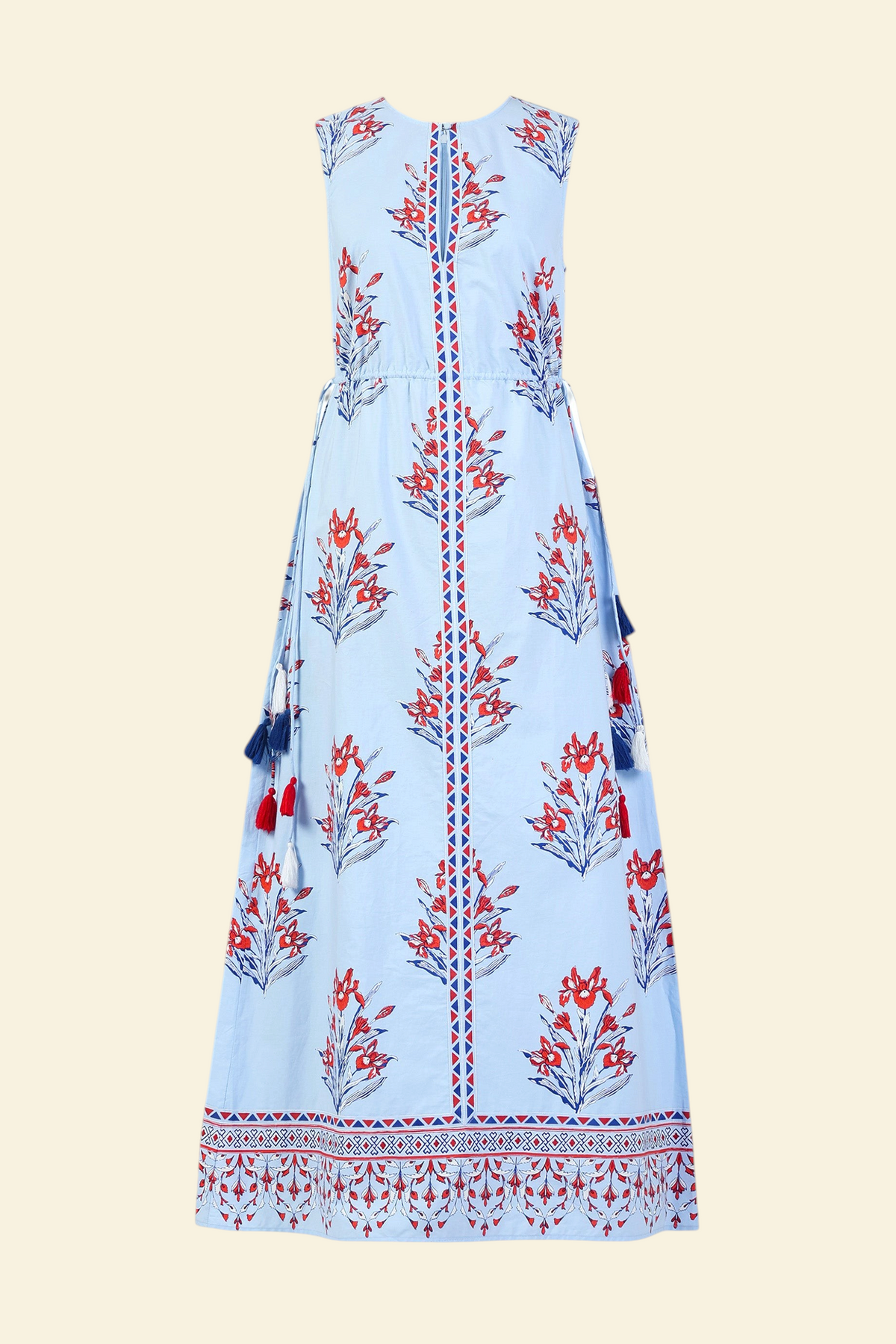 Front view of the Rhonda dress in the Brigitte print, featuring a sleek column silhouette, side drawstring details with fringe accents, a keyhole neckline, and iris floral motifs.