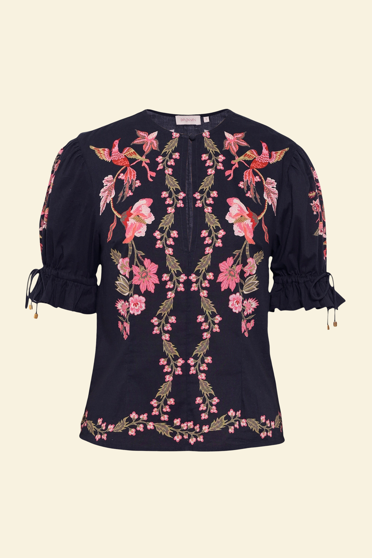 Front view of the Ricki top in Chintz print, featuring a crewneck with keyhole detail, adjustable drawstring sleeves, and vintage-inspired print placement.