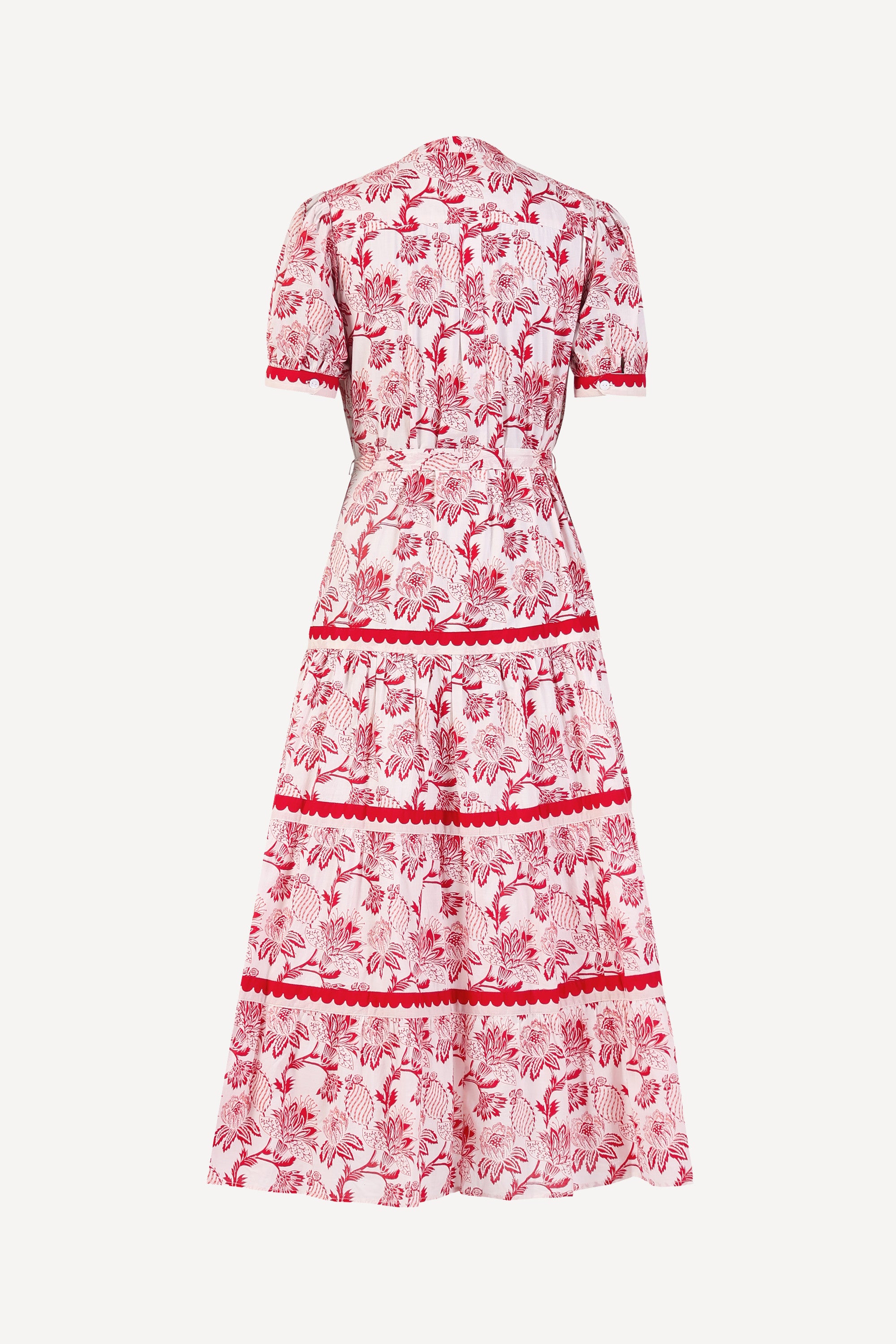 Back view of the Saylor full-length shirtdress in Lizzie floral print. It features tiered skirt, wavy trim, and detachable belt.