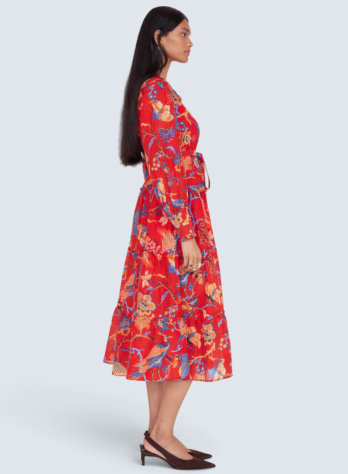 Banjanan Emira dress in carmine red cotton silk with a vintage-inspired floral chintz print and ruffled skirt.