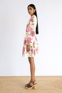 Side view of model standing wearing a full sleeve mini Allegra Dress Killara Border Syrath.