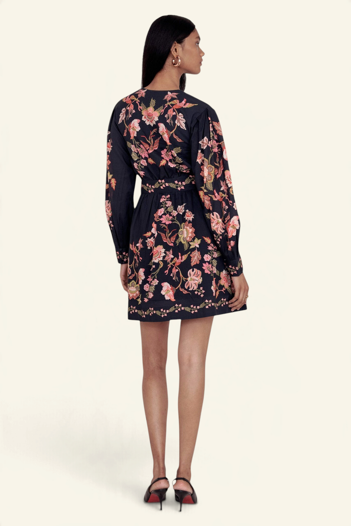 Banjanan Anne mini dress in black cotton voile with a floral Chintz print, long sleeves, and a belted waist.