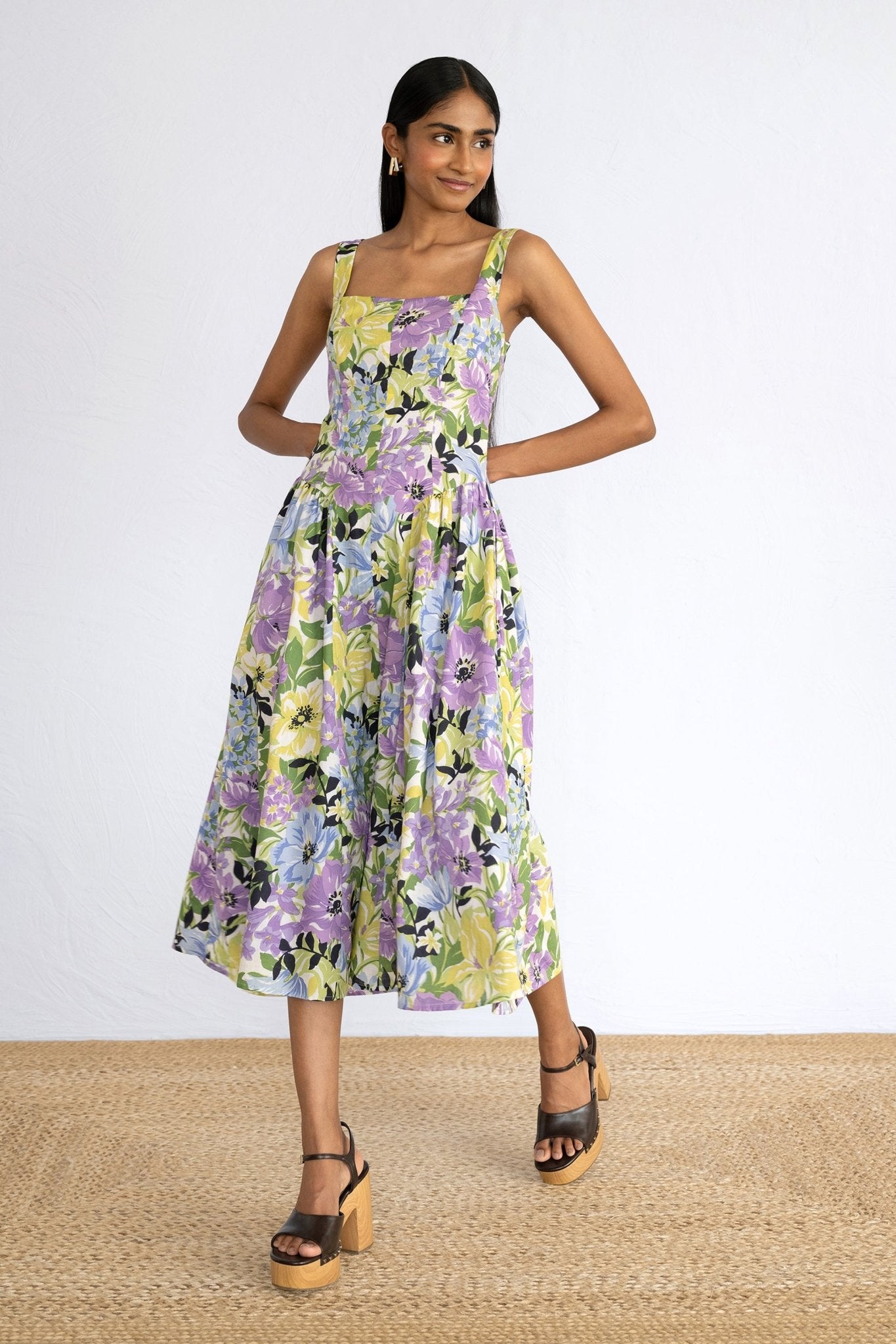 Front side view of model standing wearing Aurora Dress in Bouquet Chive print. 