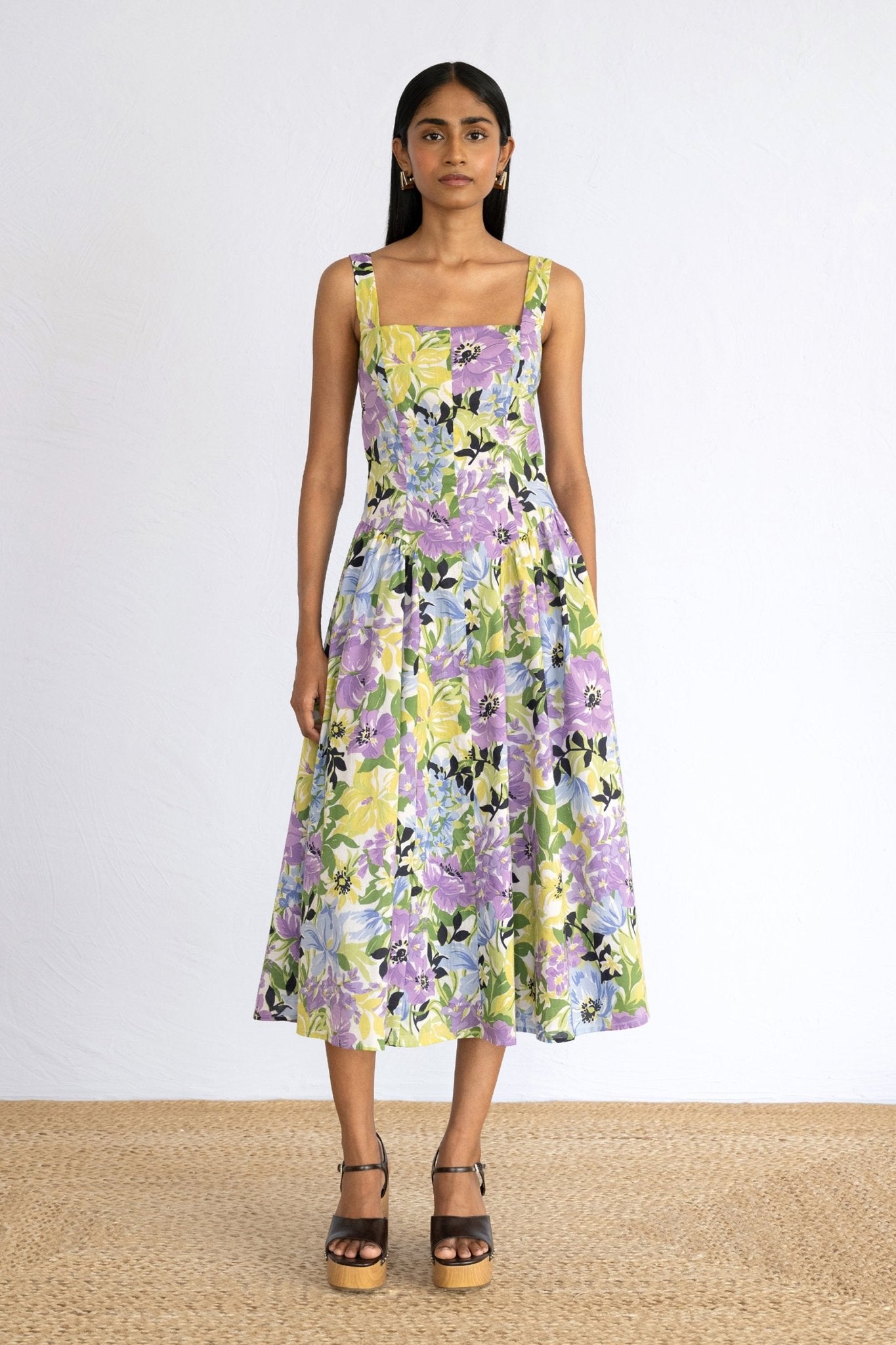 Front view of model standing wearing Aurora Dress in Bouquet Chive print. 