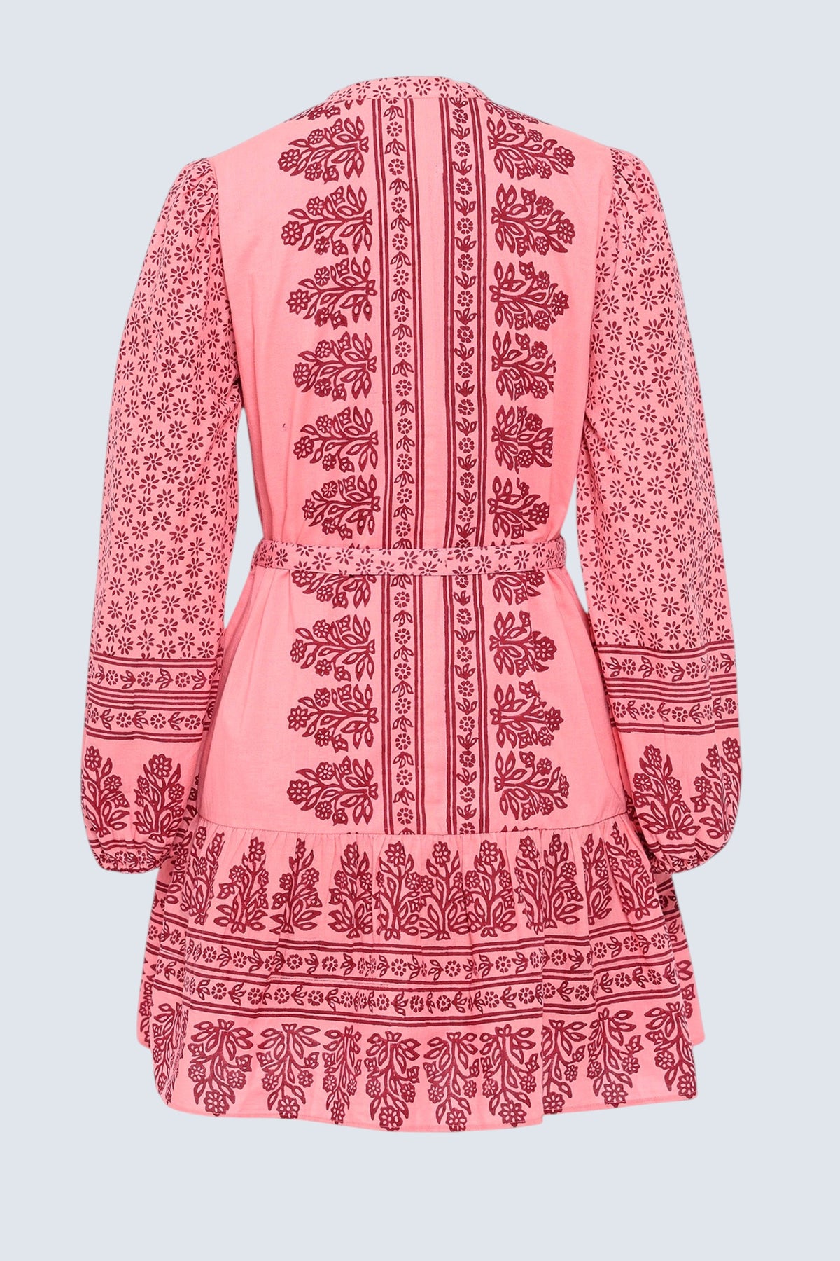 Back view of the Roma dress in Eugenie print, featuring a mini length, wrist-length sleeves, a detachable belt, and side-seam pockets.