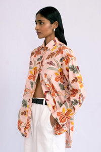 Side view of model wearing a full sleeve Charlotte Shirt Bali Floral Lotus.