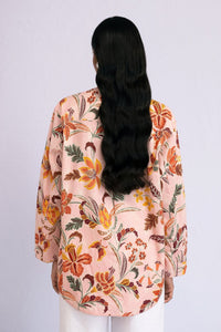 Back view of model wearing a full sleeve Charlotte Shirt Bali Floral Lotus.