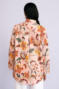 Back view of model wearing a full sleeve Charlotte Shirt Bali Floral Lotus.