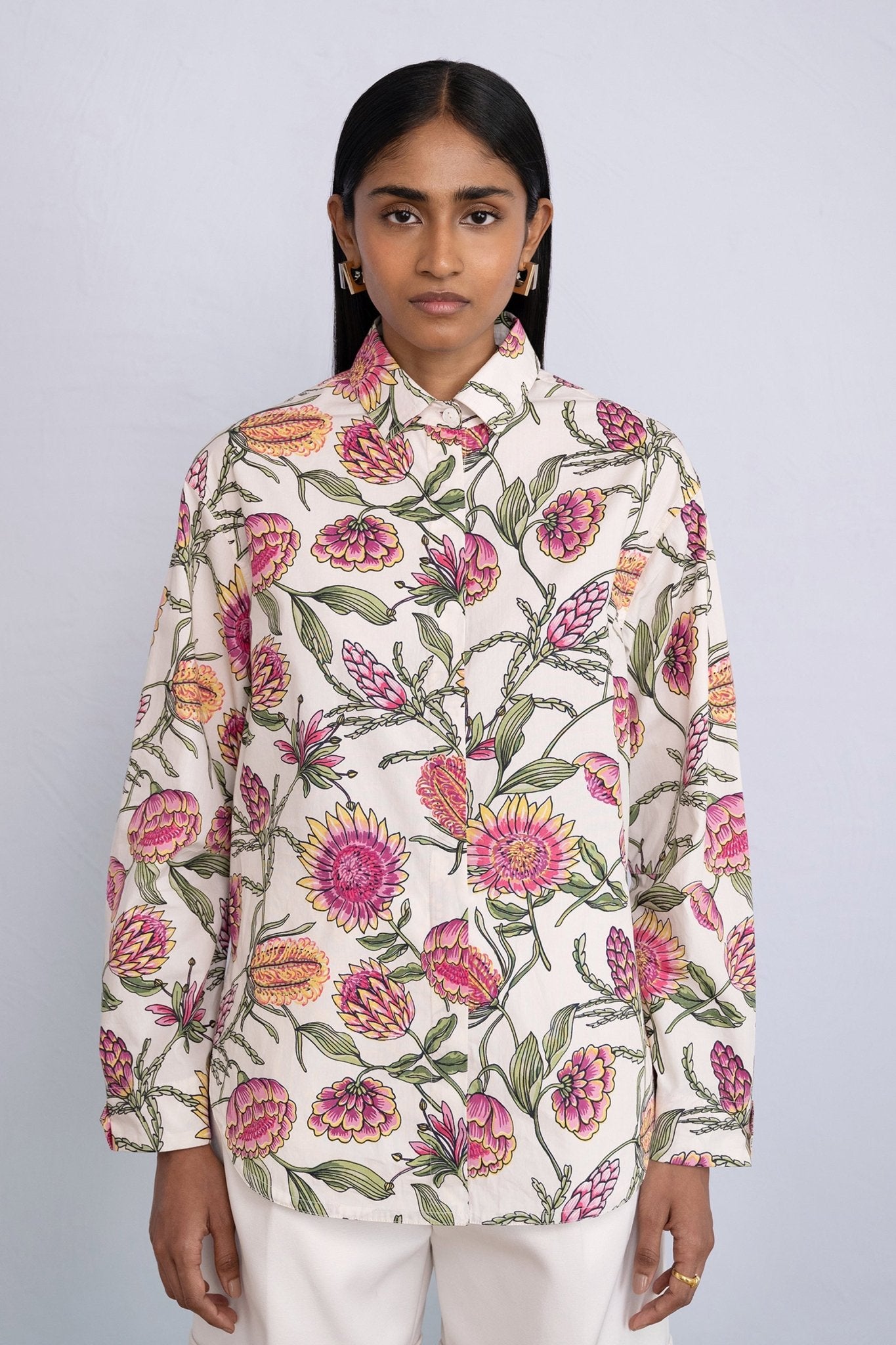 Front view close up of model wearing Charlotte Shirt in Protea Cypress print.