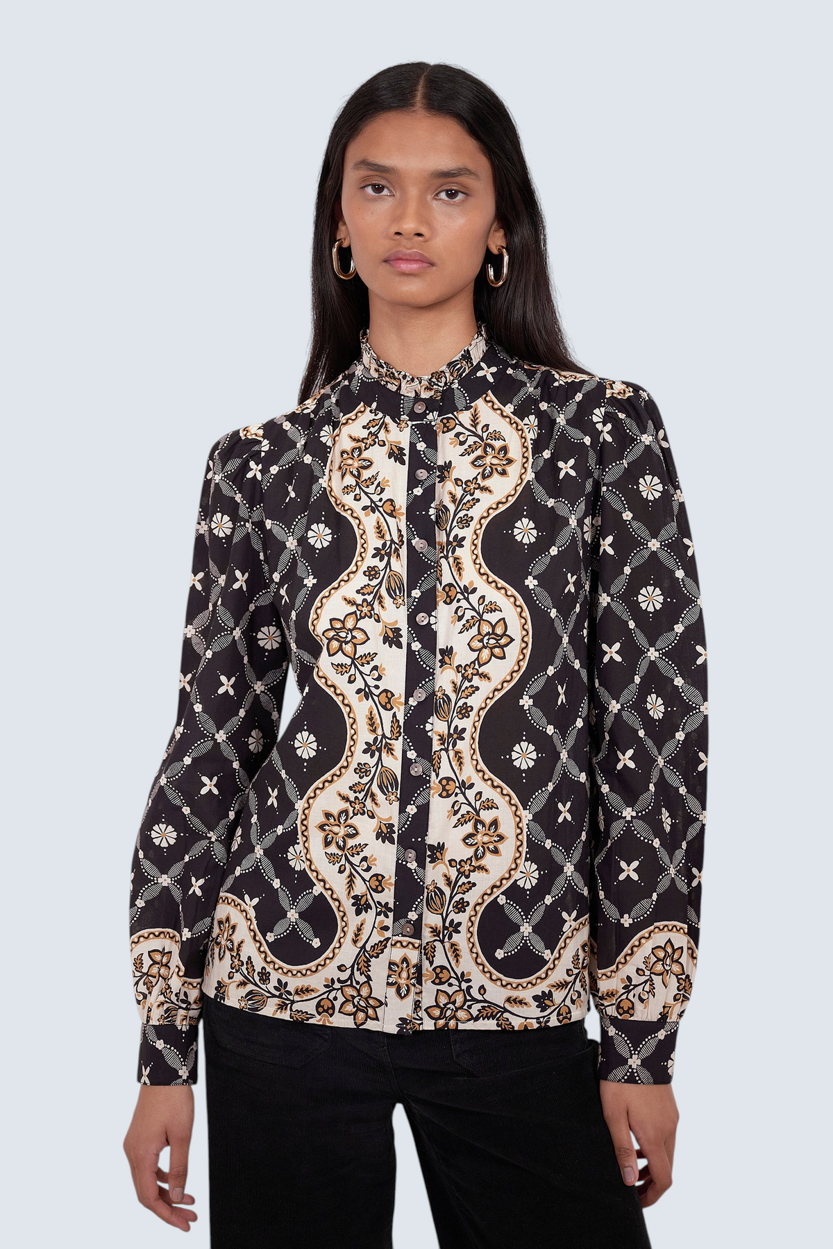 Banjanan Christina shirt in black with a Victorian-inspired geometric bandana print, frilled collar, and puff sleeves.
