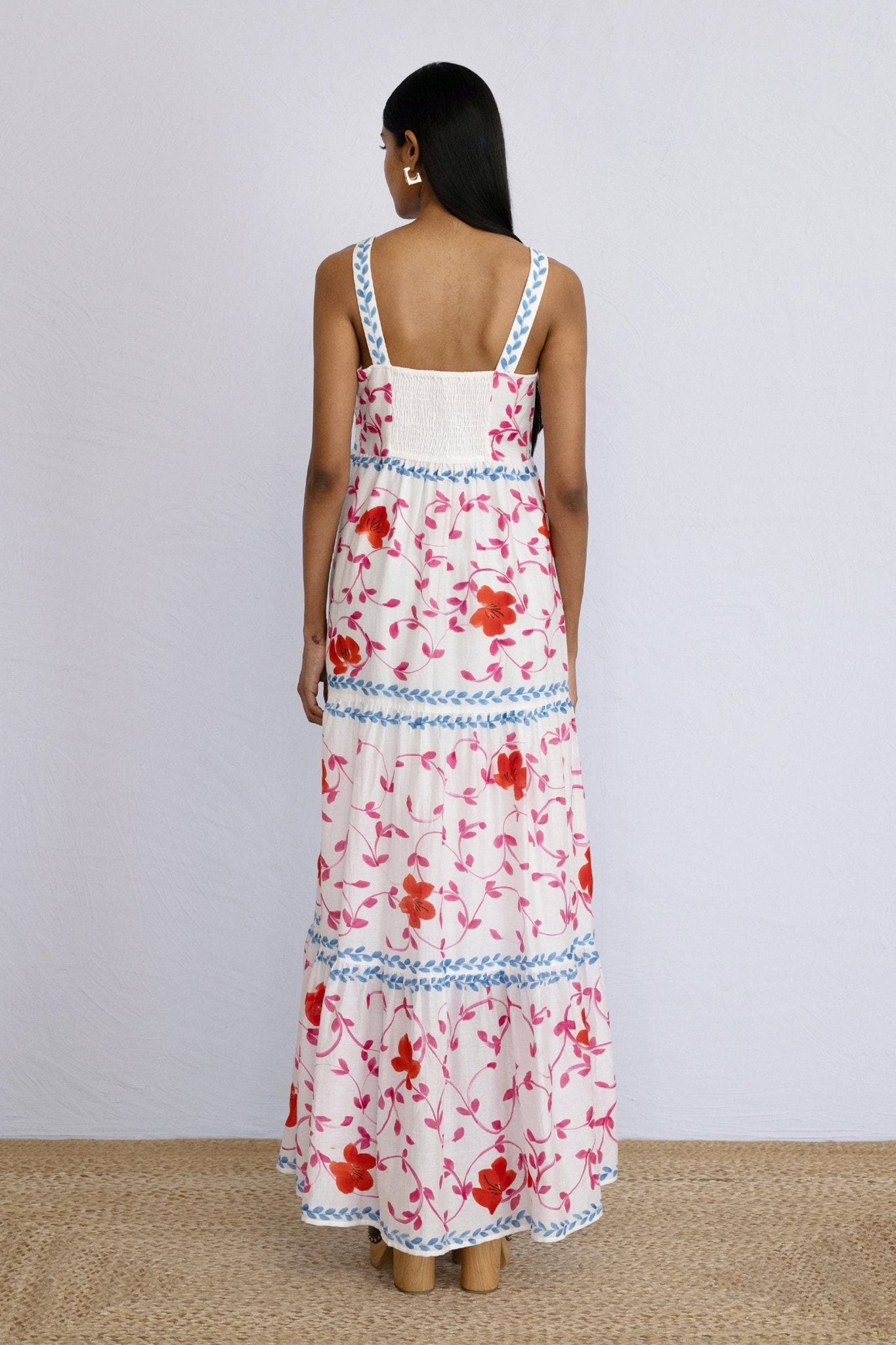 Back view of model standing wearing full length Daniella Dress Hand Painted Opium.