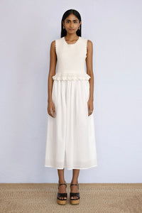 Model standing straight wearing Heather Crochet Dress in Ivory color.