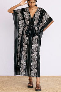 Front view of model wearing Jayden Kaftan Lombok Border Black.