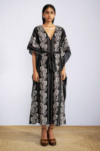 Front view of model wearing Jayden Kaftan Lombok Border Black.