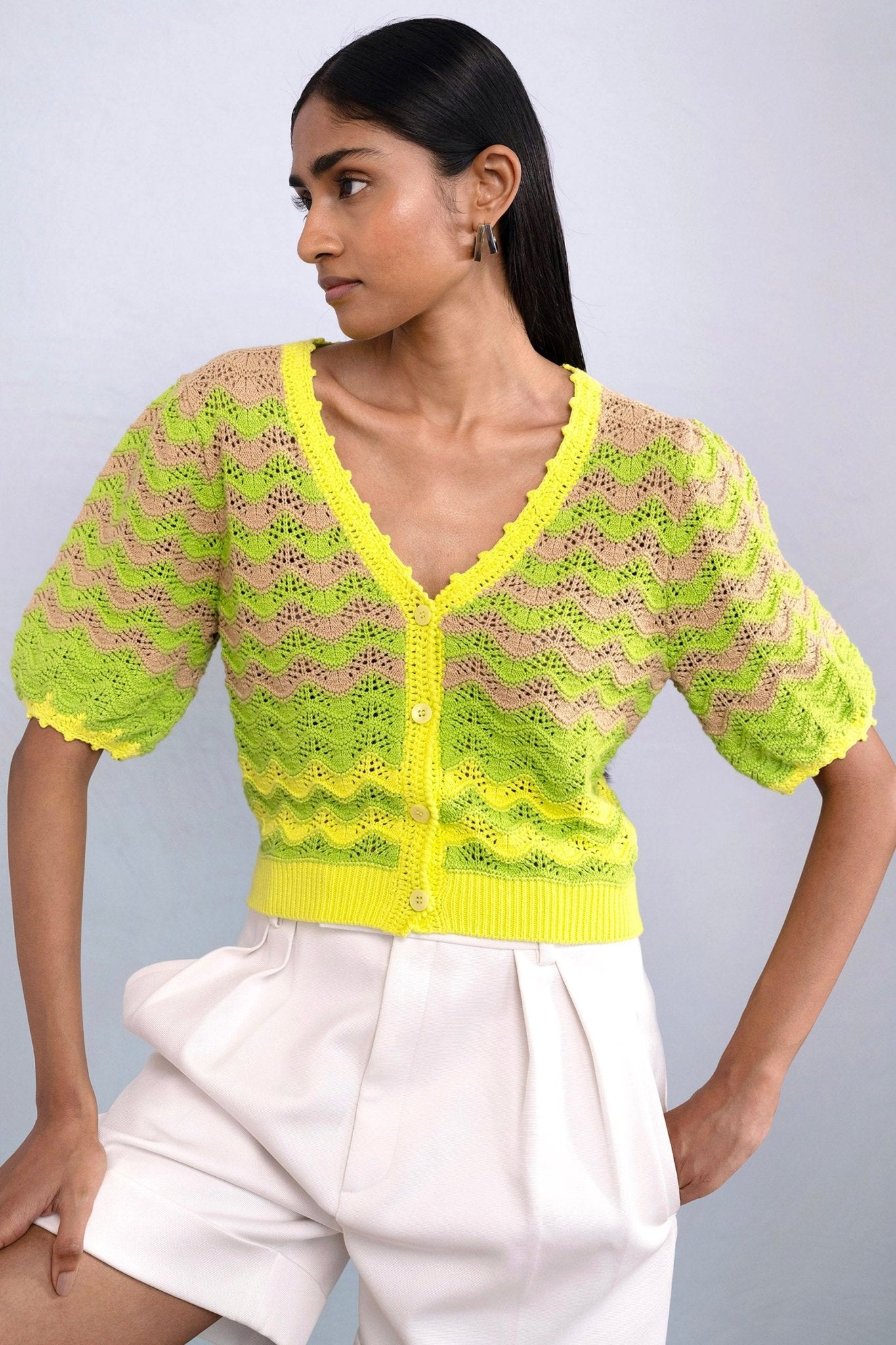 Front view of model wearing Kate Chevron Cardigan Chive