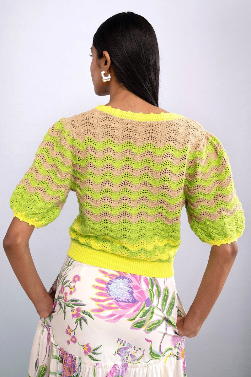 Back view of model wearing Kate Chevron Cardigan Chive