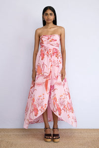 Front view of model standing wearing strapless Madison Dress in Botany Bay Pink Mist print.