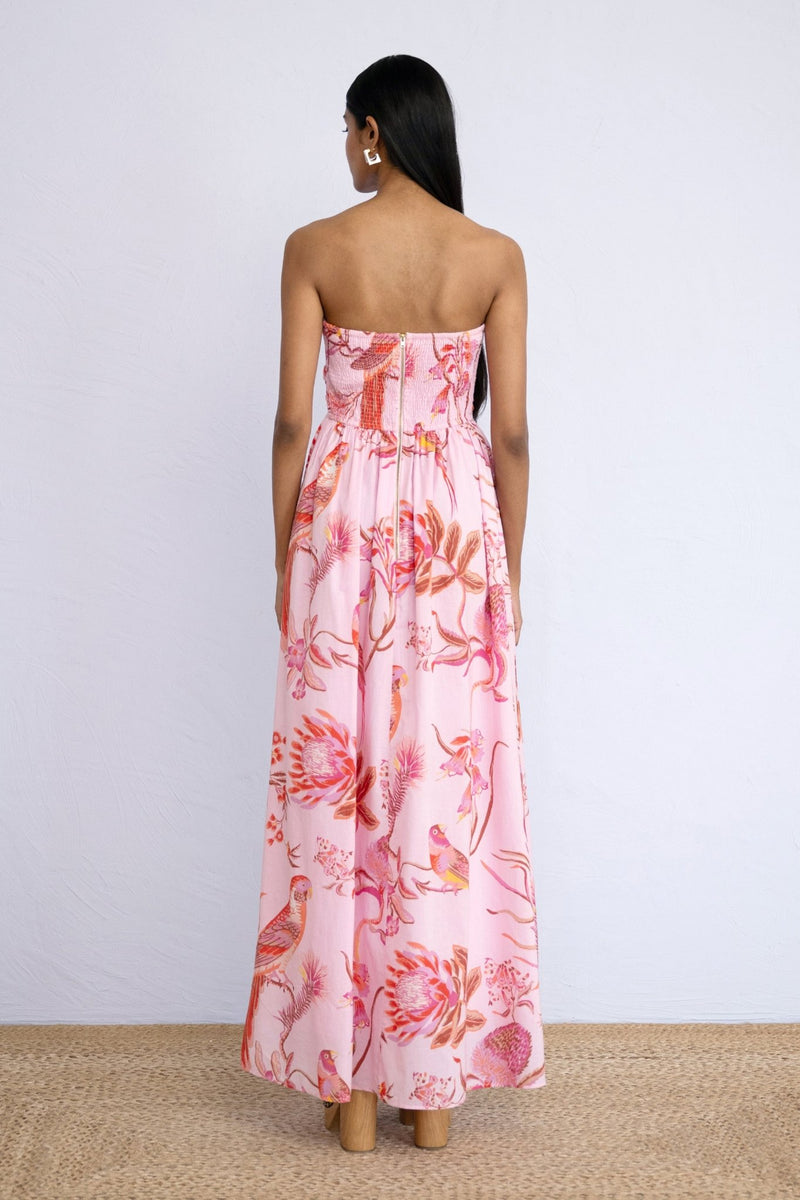 back view of model standing wearing strapless Madison Dress in Botany Bay Pink Mist print.