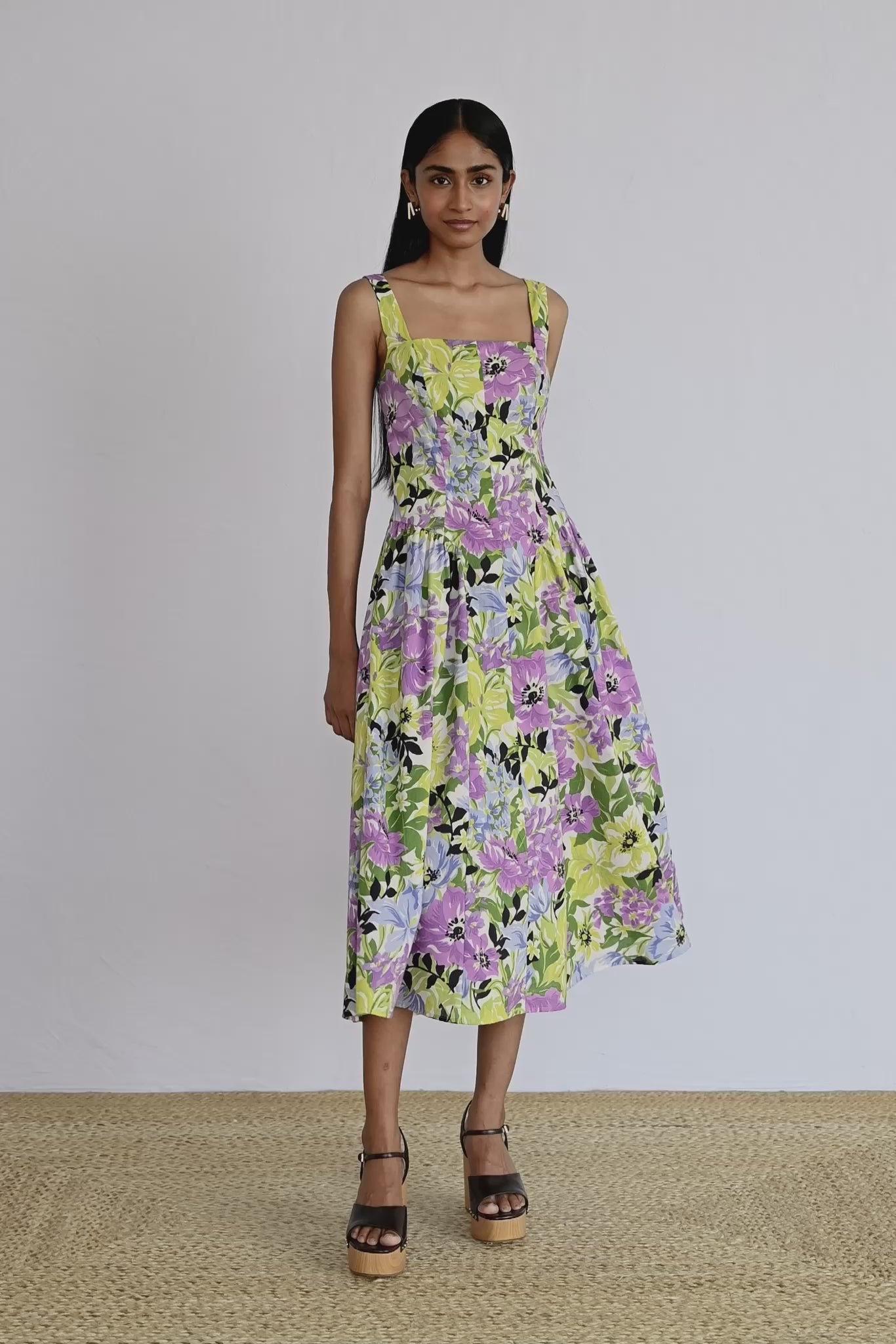 Video of model wearing Aurora Dress in Bouquet Chive print showing all sides of the dress.