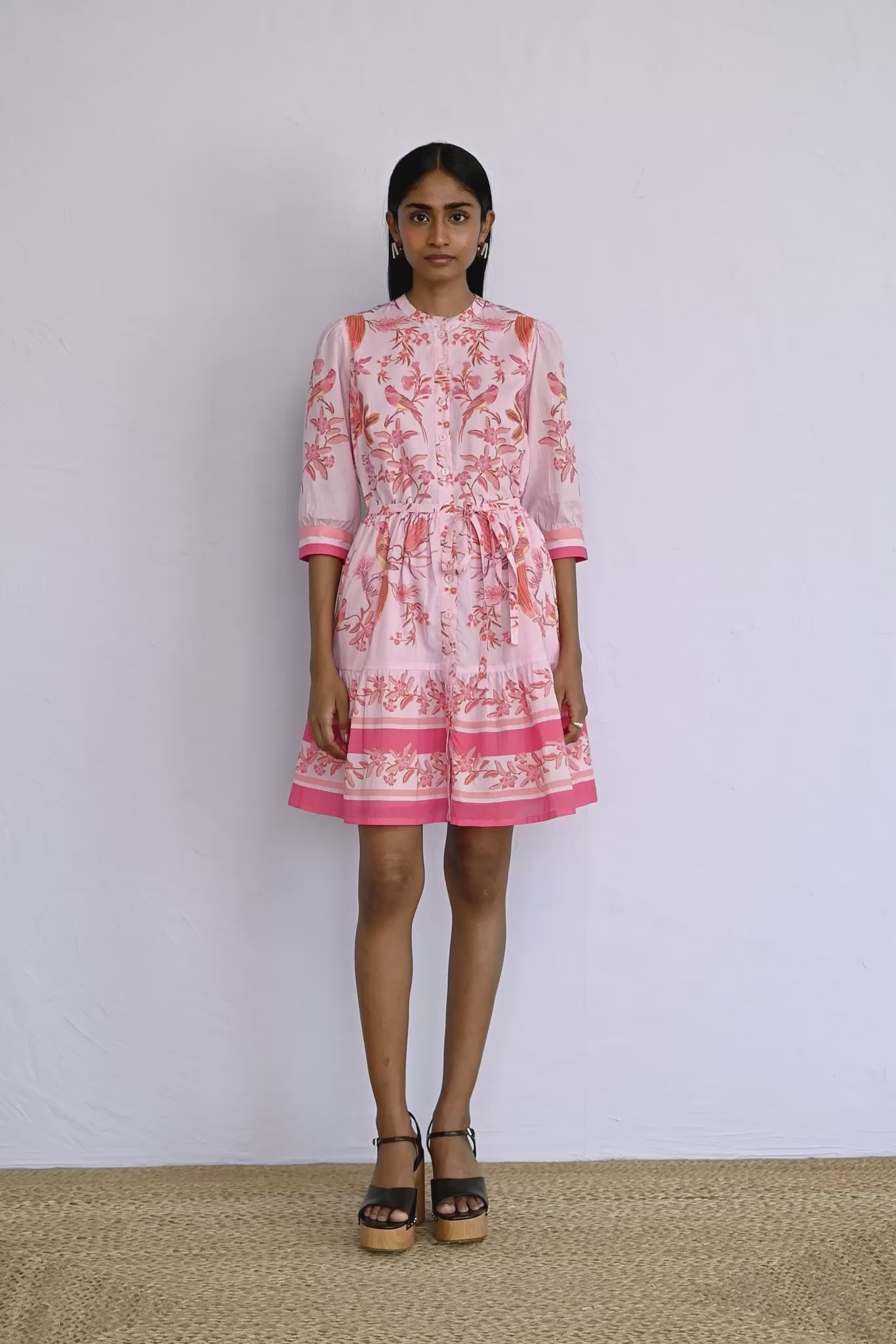 Video of model wearing a Gizela Dress in Botany Bay Pink Mist print showing all sides of the dress.