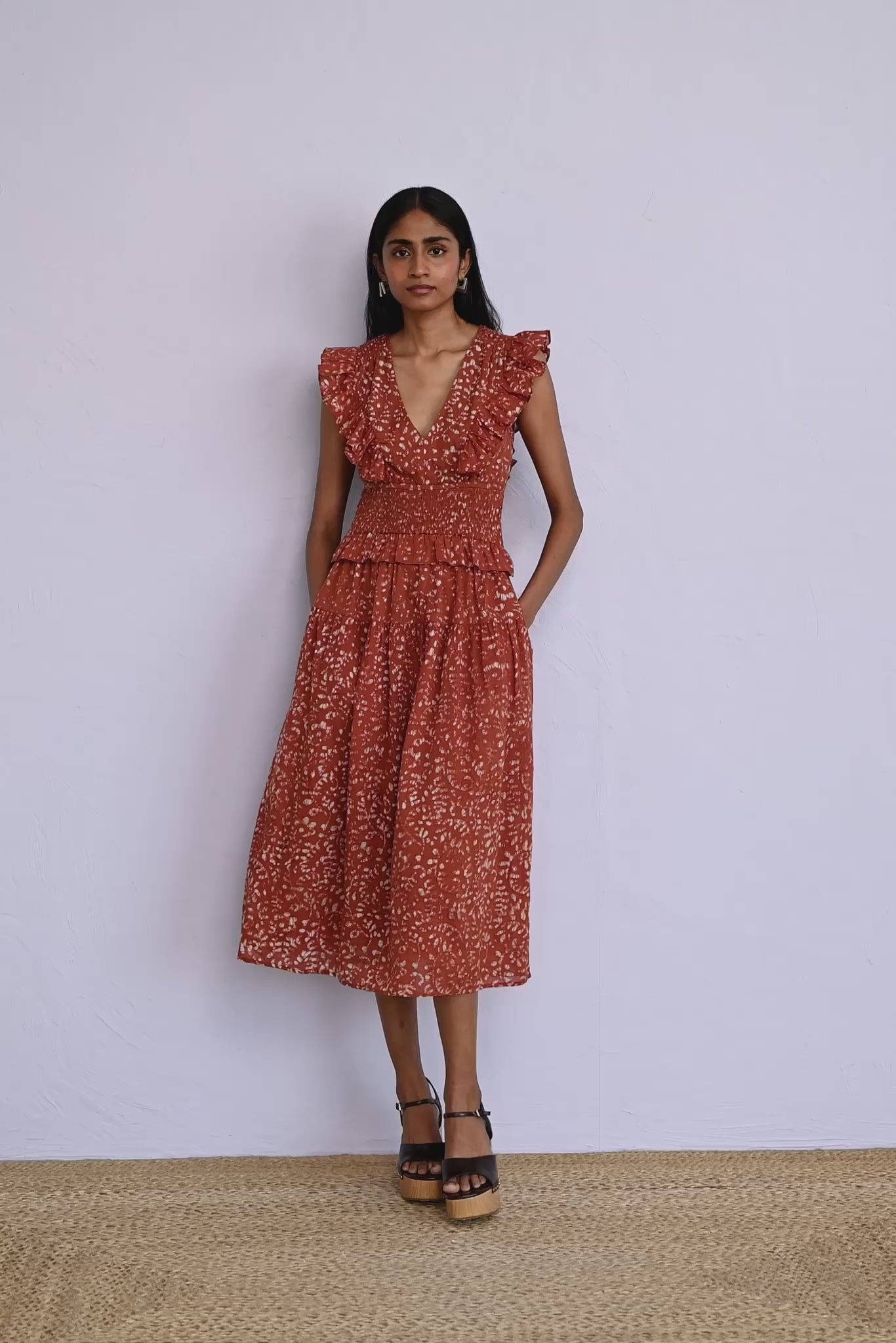 Video of model wearing Keira Dress in block printed Bondi Batik print, Tobacco colour showing all sides of the garment.