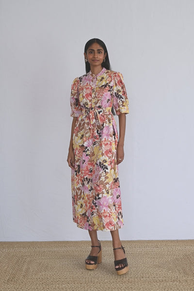Video of model wearing a calf length Daffodil Dress Bouquet Antique showing all sides of the dress.