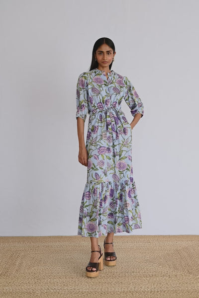 Video of model wearing Betty Dress in Protea Orchid print showing all sides of the dress.