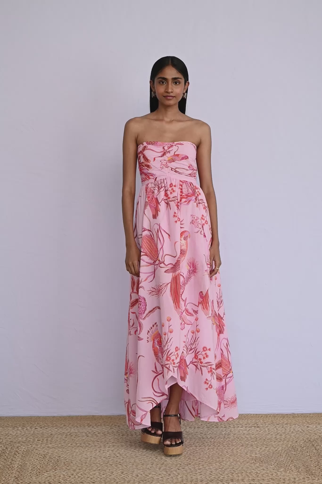 Video of model wearing strapless Madison Dress in Botany Bay Pink Mist print showing all sides of the dress.