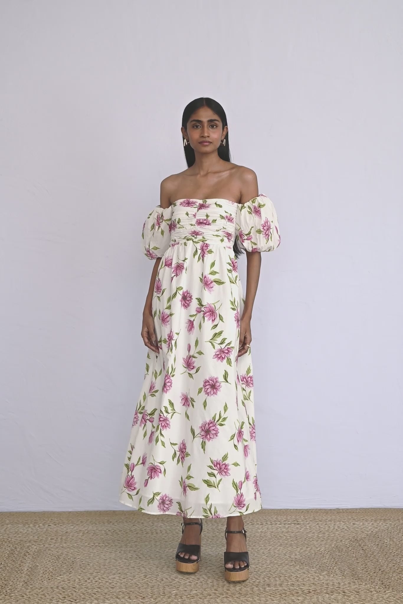 Video of model wearing an off shoulder styled Farida Dress Killara Syrath showing all sides of the dress.