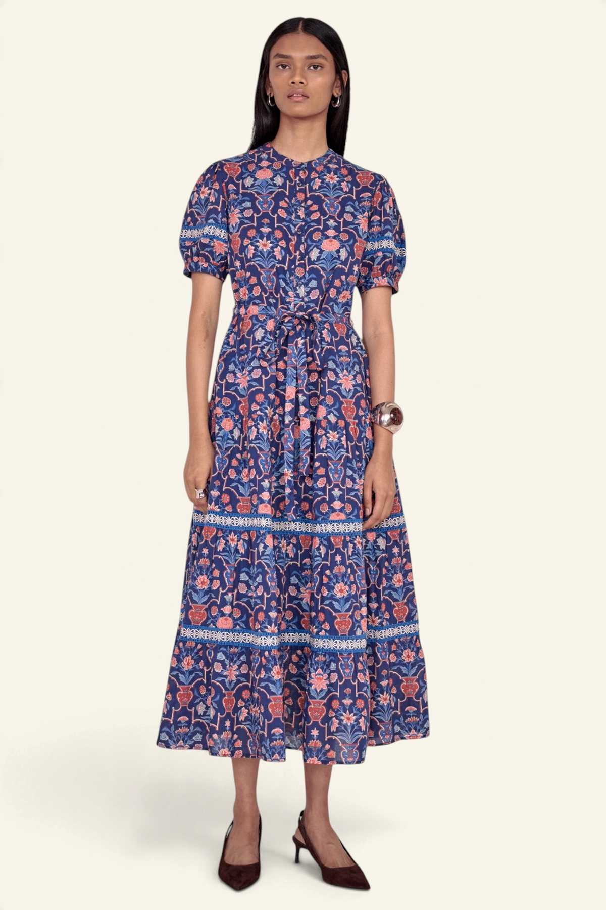Banjanan Saylor midi shirtdress in blue floral vase print with lace trim, tiered skirt, and detachable waist belt.