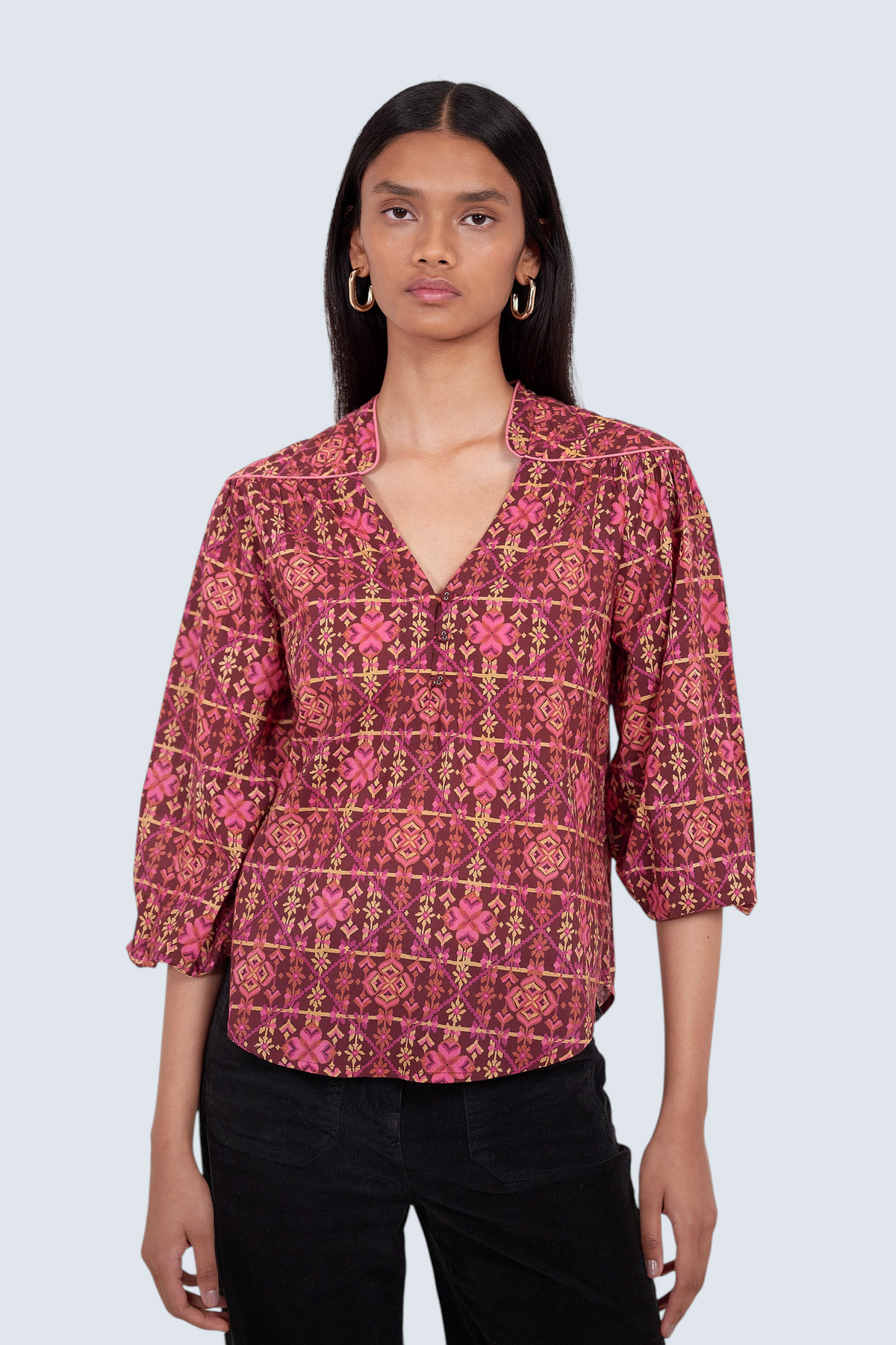 Banjanan Vanessa top in mahogany cotton voile with a pink geometric floral needlepoint print and v-neckline.